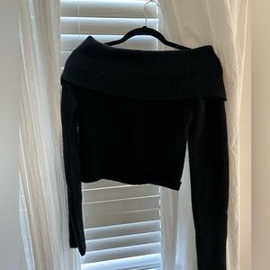 Babaton black bustle sweater “off shoulder”